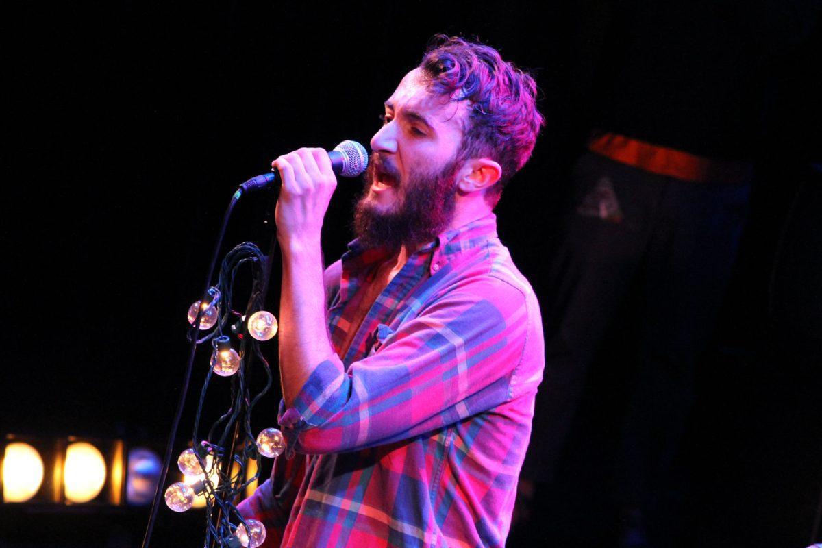 Will Horton of The Black Cadillacs sings in front of a sold-out audience at the Bijou Theatre on Saturday. Nearly 700 fans came out for the band's first local performance in more than a year.