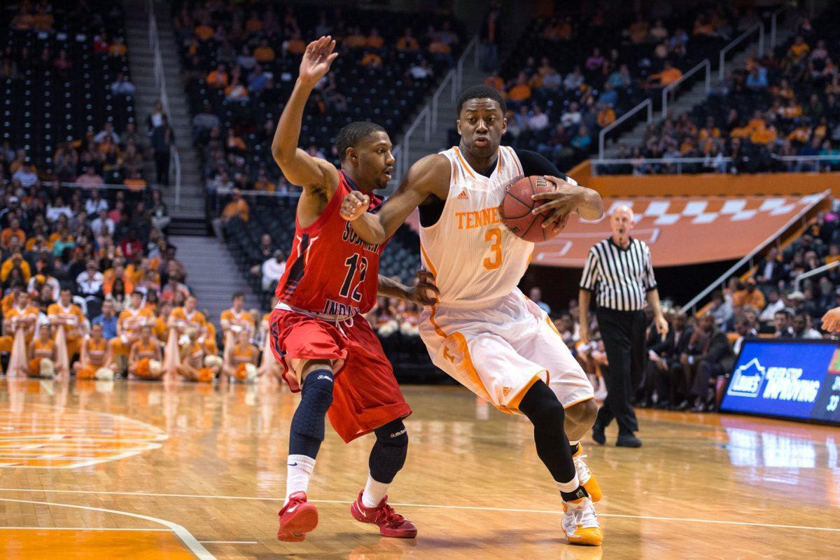 Tennessee freshman guard Robert Hubbs III drives past a Southern Indiana defender during an exhibition game at Thompson-Boling Arena on Thursday.