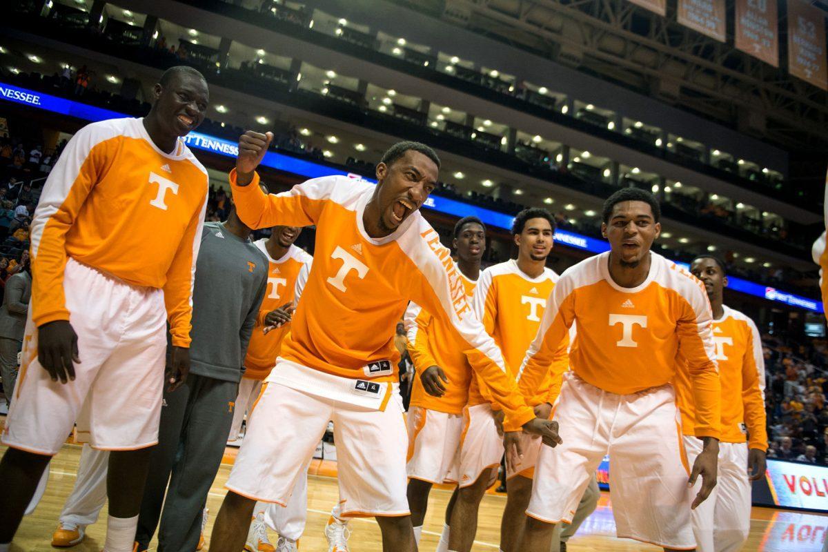 Senior guard Jordan McRae, center, yells during pregame festivities for UT's exhibition on Saturday at Thompson-Boling Arena. The Vols beat Florida Southern 105-80.