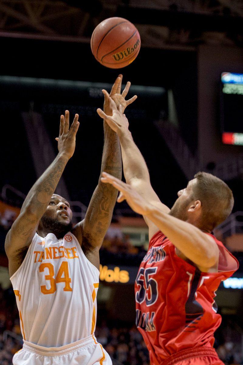 Senior forward Jeronne Maymon shoots over a Southern Indiana defender during an exhibition matchup at Thompson-Boling Arena on Nov. 7.
