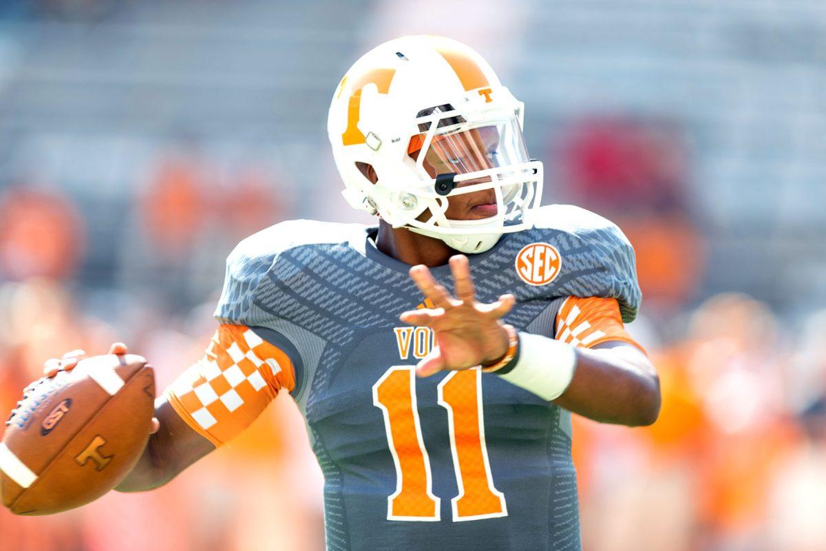 Tennessee freshman quarterback Josh Dobbs warms up before UT's matchup against Georgia at Neyland Stadium on Oct. 5, 2014.