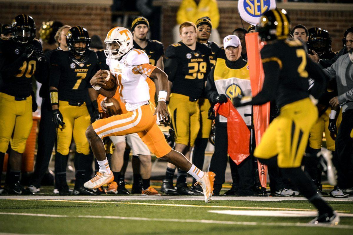 Tennessee freshman quarterback Josh Dobbs rushes during UT's game against the Missouri Tigers at Memorial Stadium on Nov. 2.