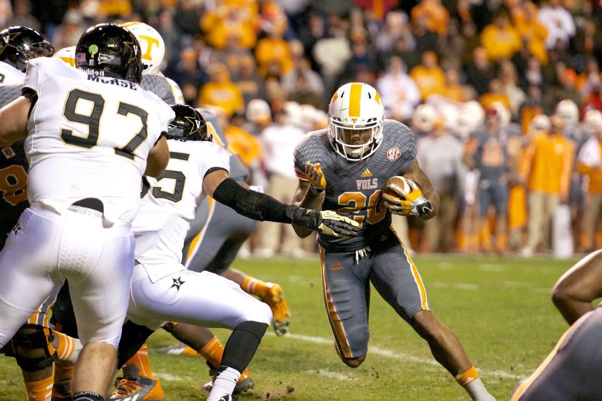 Tennessee senior running back Rajion Neal runs the ball during UT's 14-10 loss to Vanderbilt at Neyland Stadium on Saturday, Nov. 23. Neal finished the game with 95 yards and a touchdown on 22 carries and surpassed 2,000 career rushing yards with his effort.