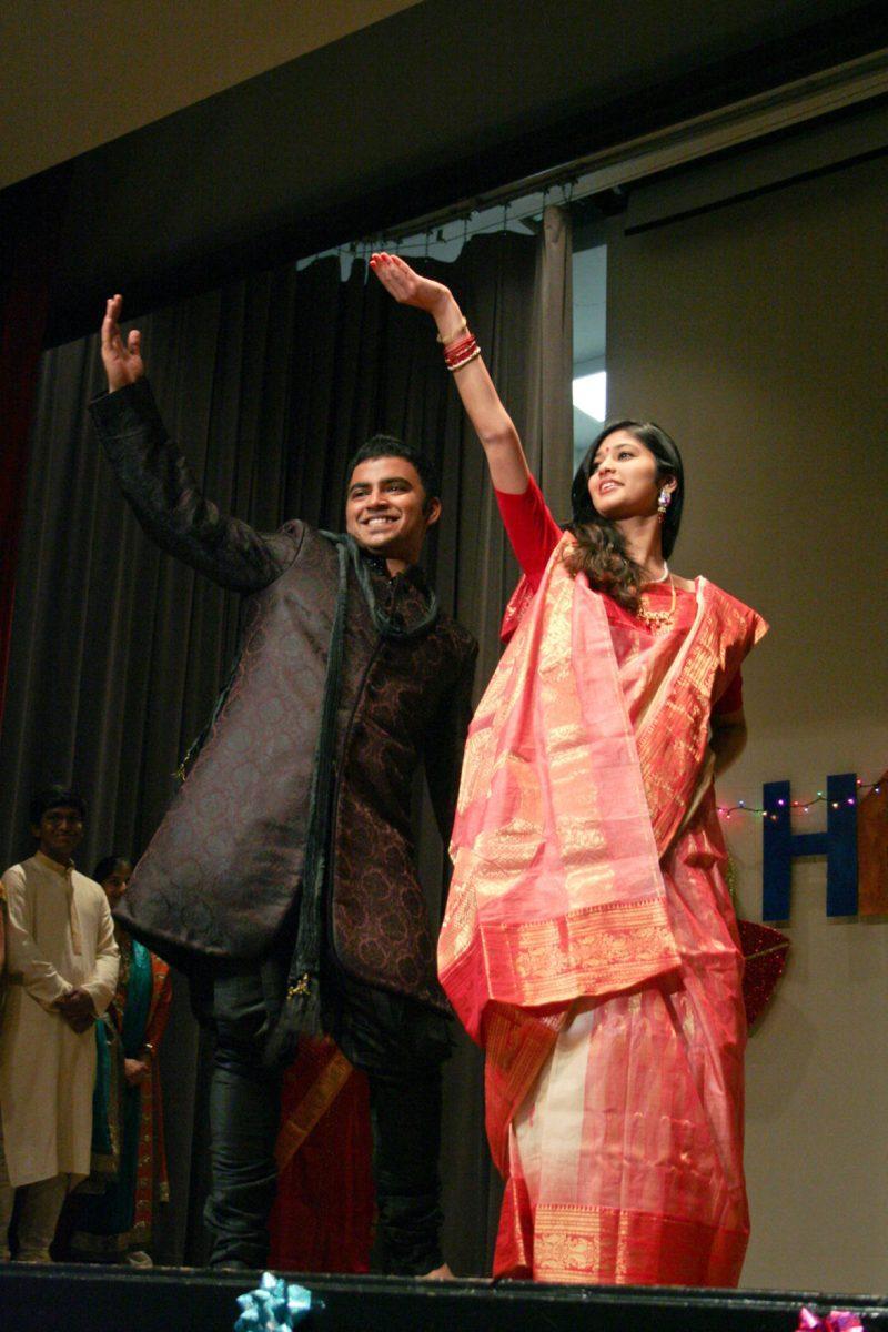 Participants in the Diwali festival fashion show introduce themselves to the audience on Sunday.