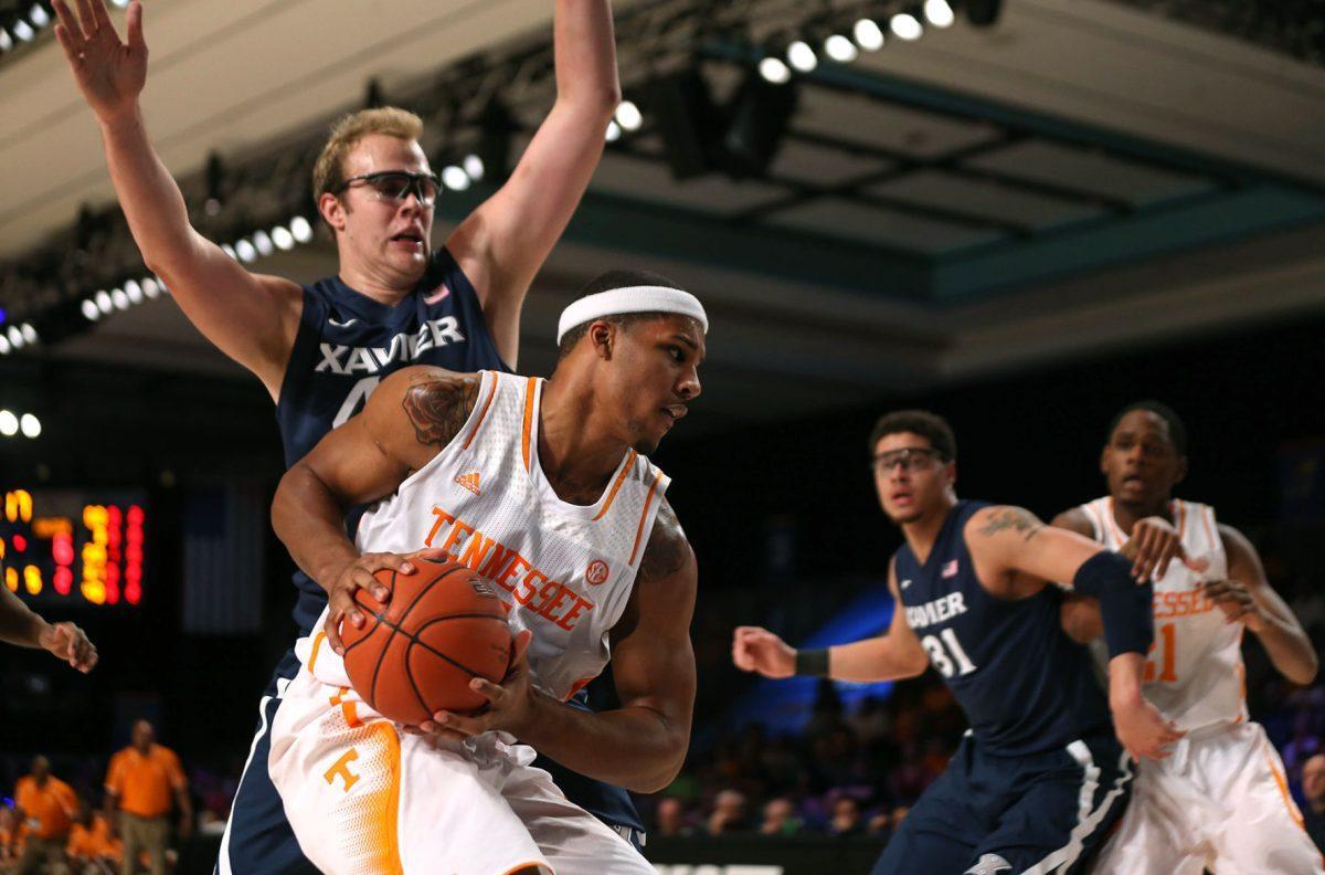 Tennessee junior forward Jarnell Stokes posts up on Xavier's Matt Stainbrook against the Musketeers at the Battle 4 Atlantis at Paradise Island, Bahamas on Friday, Nov. 29. Stokes registered a double-double in all three of the Vols' contests in the tournament.