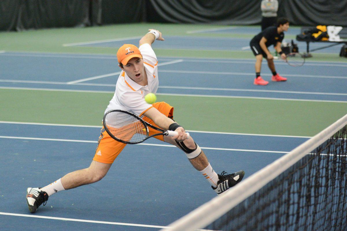 Junior Hunter Reese returns a volley during the ITA Kickoff Weekend qualifier match between UT and the VCU Rams at the Goodfriend Tennis Center on Jan. 26.