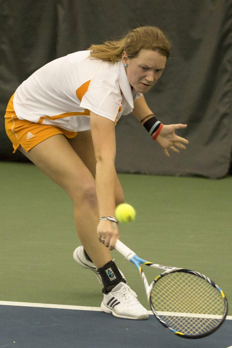 Junior Joanna Henderson reaches down for a return during Tennessee's 4-2 win over Vanderbilt on March 24, 2013 at the Goodfriend Tennis Center. Henderson led the Vols to a 1-1 record this past weekend in the ITA Kickoff Championship as UT defeated Purdue but lost to Clemson.