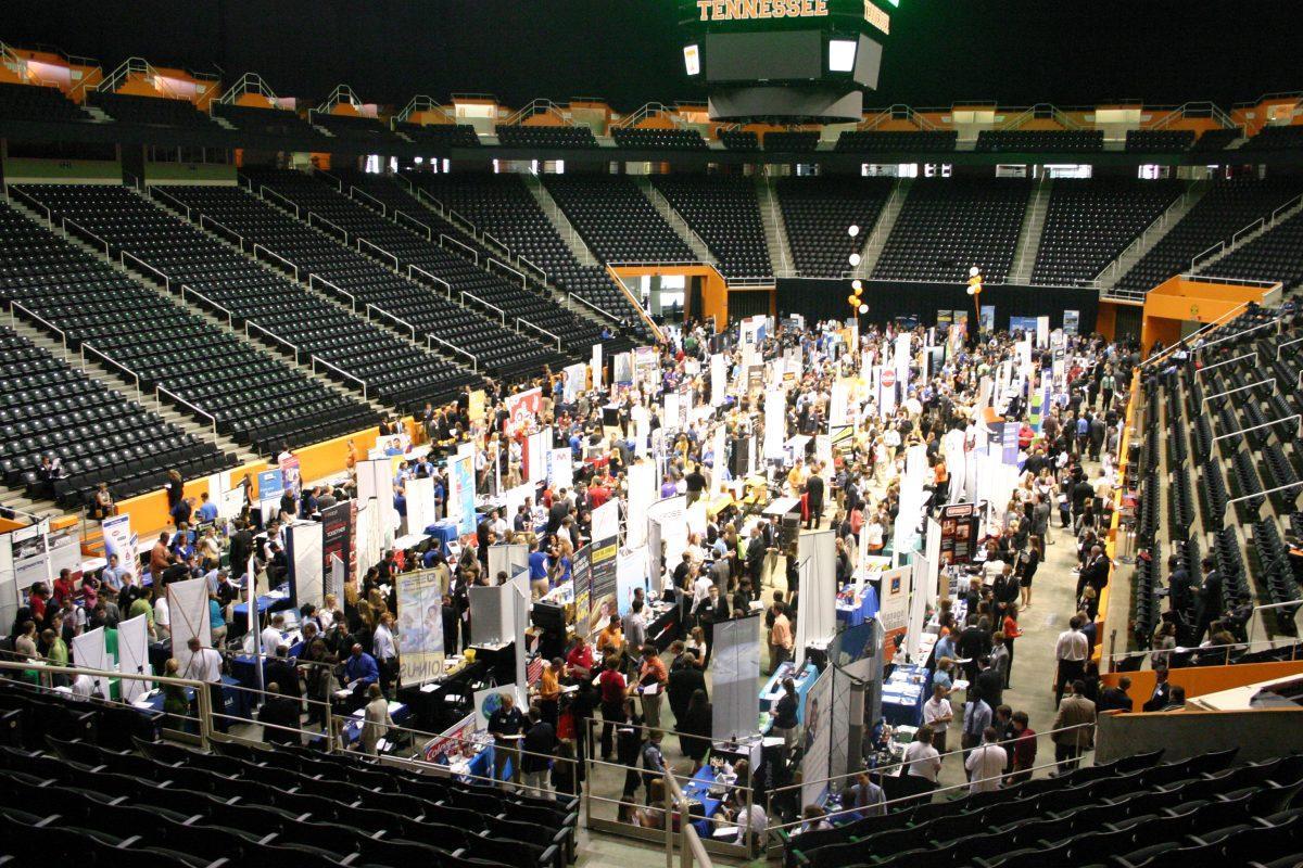 More than 170 corporate employers, government agencies and non-profit organizations fill the floor within Thompson-Boling Arena for the Fall Job Fair on Sept. 24, 2013. This semester's job and internship fair will be held on Tuesday, Feb. 4, from 2-6 p.m. on the floor of Thompson-Boling Arena.