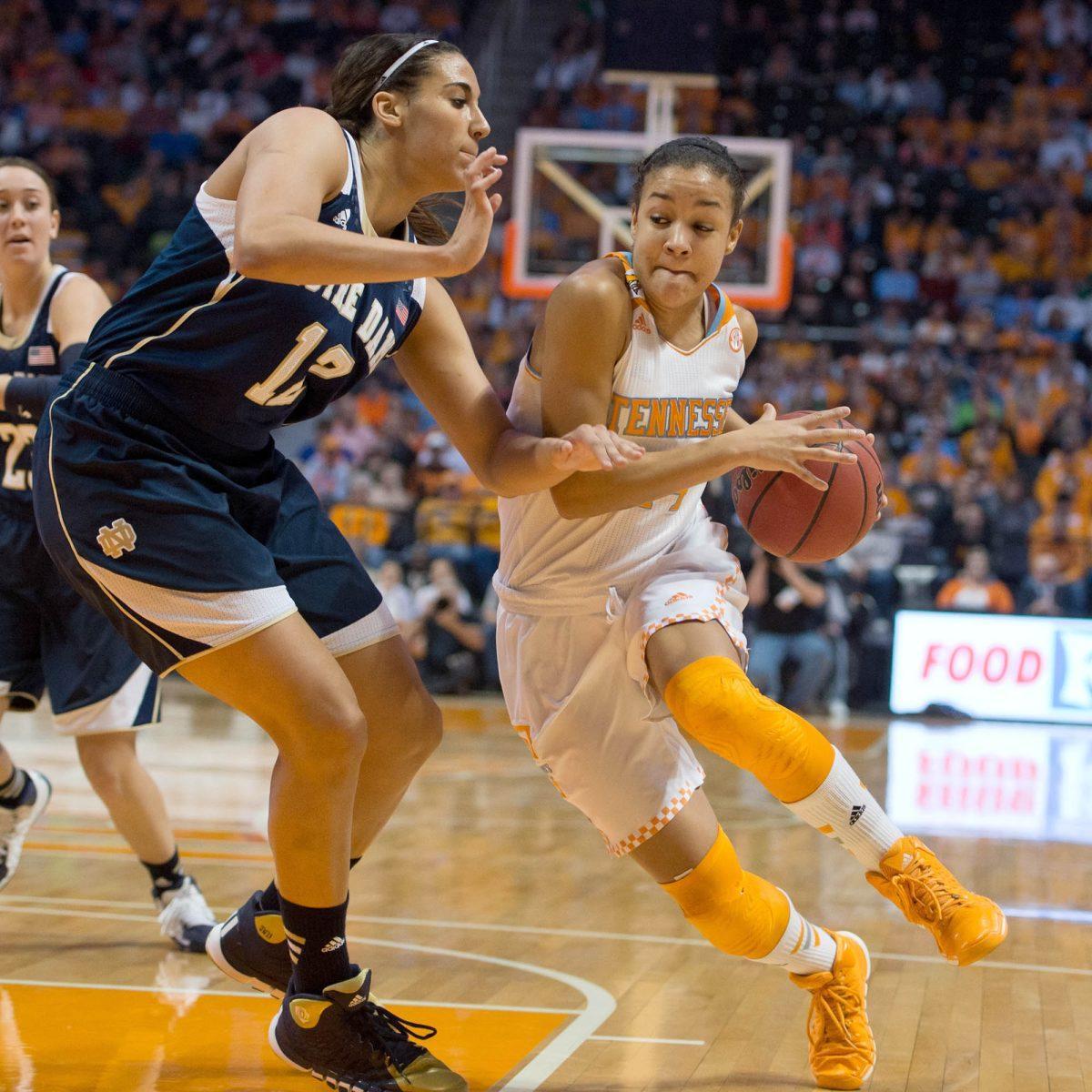 Redshirt freshman guard Andraya Carter drives past Notre Dame defenders in UT's 86-70 loss to the No. 2 Irish at Thompson-Boling Arena on Jan. 20.