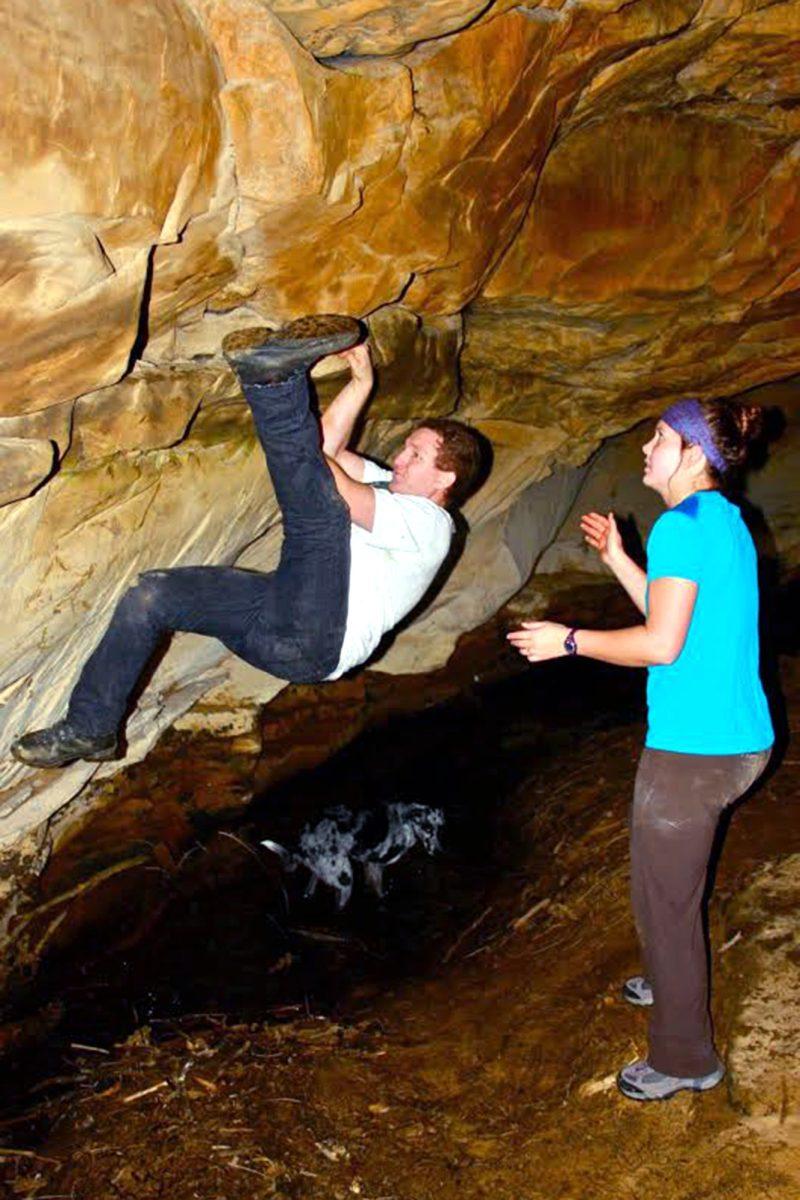 Leslie Turner, left, spots Keith Shook while he climbs during the Virgin Falls backpacking trip put on by the UT Canoe and Hiking Club last semester.