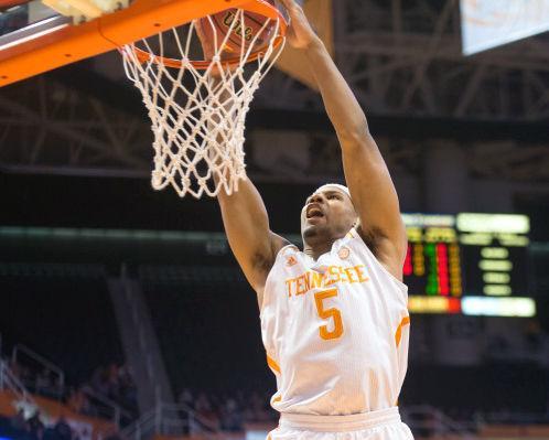 Tennessee junior forward Jarnell Stokes dunks in a game against the Auburn Tigers at Thompson-Boling Arena on Jan. 15. Stokes revealed before Tuesday's practice he suffered a dislocated shoulder on Jan. 4 against Tusculum and has since been playing through the injury.