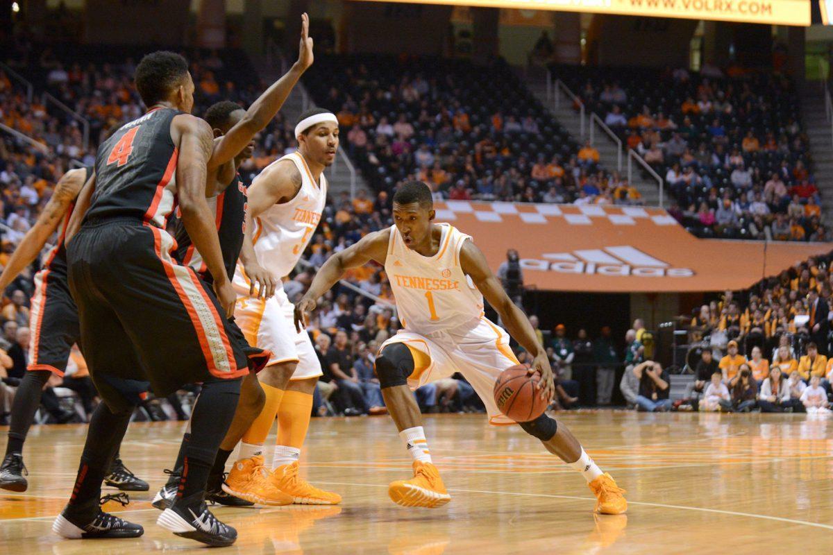 Junior guard Josh Richardson, right, drives through the lane in Vols' 67-48 win over Georgia at Thompson-Boling Arena on Feb. 18.