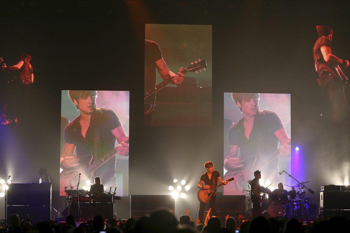 Country artist Keith Urban performs his song "Sweet Thing" as part of the "Light the Fuse Tour" at Thompson-Boling Arena on Friday.