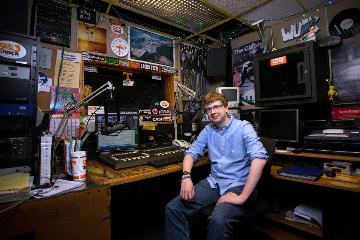 Nathan Smith, freshman in American studies, poses for a photo in the WUTK 90.3 studios. Smith hosts the Gold Standard Hip Hop Show every Sunday night for WUTK.