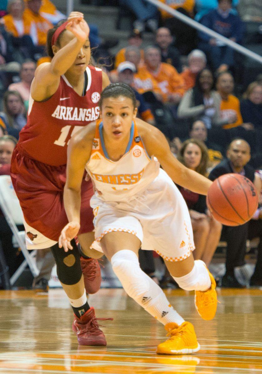 Redshirt freshman point guard Andraya Carter advances the ball past Arkansas defenders in the Lady Vols' 70-60 win over the Razorbacks at Thompson-Boling Arena on Jan. 30. Carter has replaced Ariel Massengale in the starting lineup since Massengale suffered a facial injury against Florida on Jan. 23.