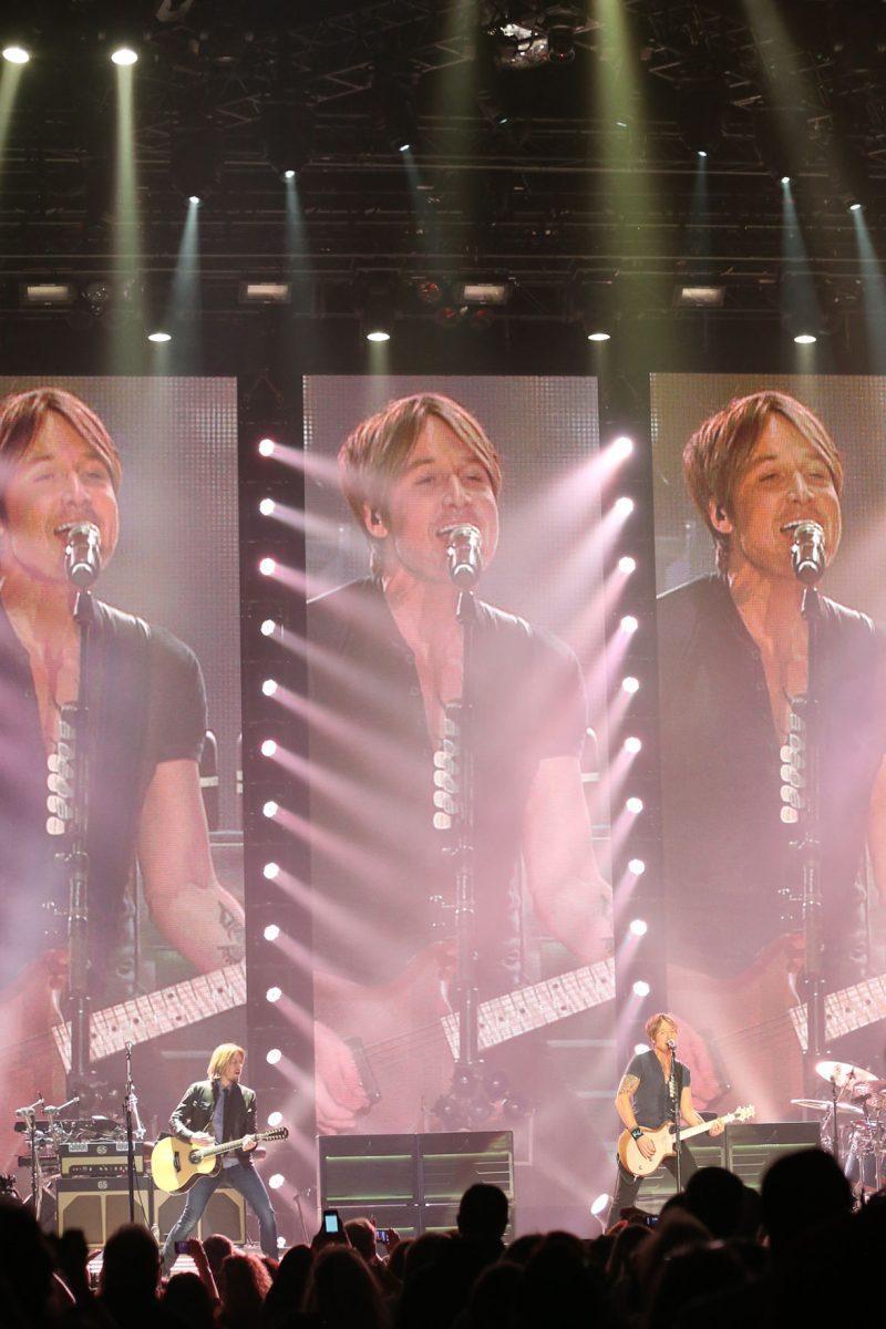 Country superstar Keith Urban is projected on a three tier jumbo-tron as he performs during the "Light the Fuse" Tour at Thompson-Boling Arena on Friday.