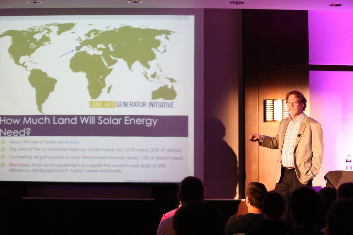 In a talk entitled "Growing Electricity: Plugging into Plants," Berry Bruce, Ph.D. and professor in the department of biochemistry and cellular and molecular biology, speaks about sustainable energy sources to the audience in the Toyota Auditorium as part of Saturday's TEDxUTK Conference.