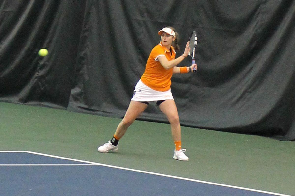 Freshman Brittany Lindl returns with her left-hand forehand during the doubles match against Georgia Tech on Feb. 15.