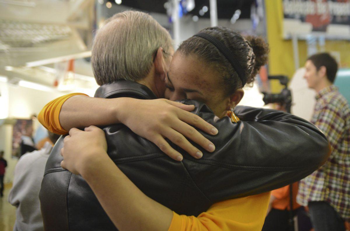 Redshirt freshman guard Andraya Carter hugs Chancellor Jimmy Cheek at the Lady Vols' Selection Monday viewing in the Women's Basketball Hall of Fame in Knoxville on March 17.