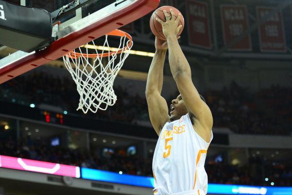 Tennessee junior forward Jarnell Stokes dunks during the Vols' 83-63 win over No. 14 seed Mercer in the second round of the NCAA tournament at PNC Arena on Sunday. Stokes tallied 17 points and 18 rebounds in the win.