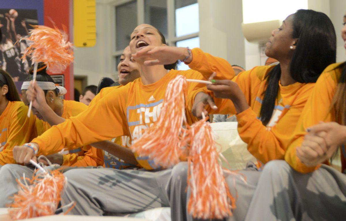 Junior forward Cierra Burdick celebrates with her teammates after receiving the No. 1 seed in the Louisville region of the NCAA Tournament on March 17.