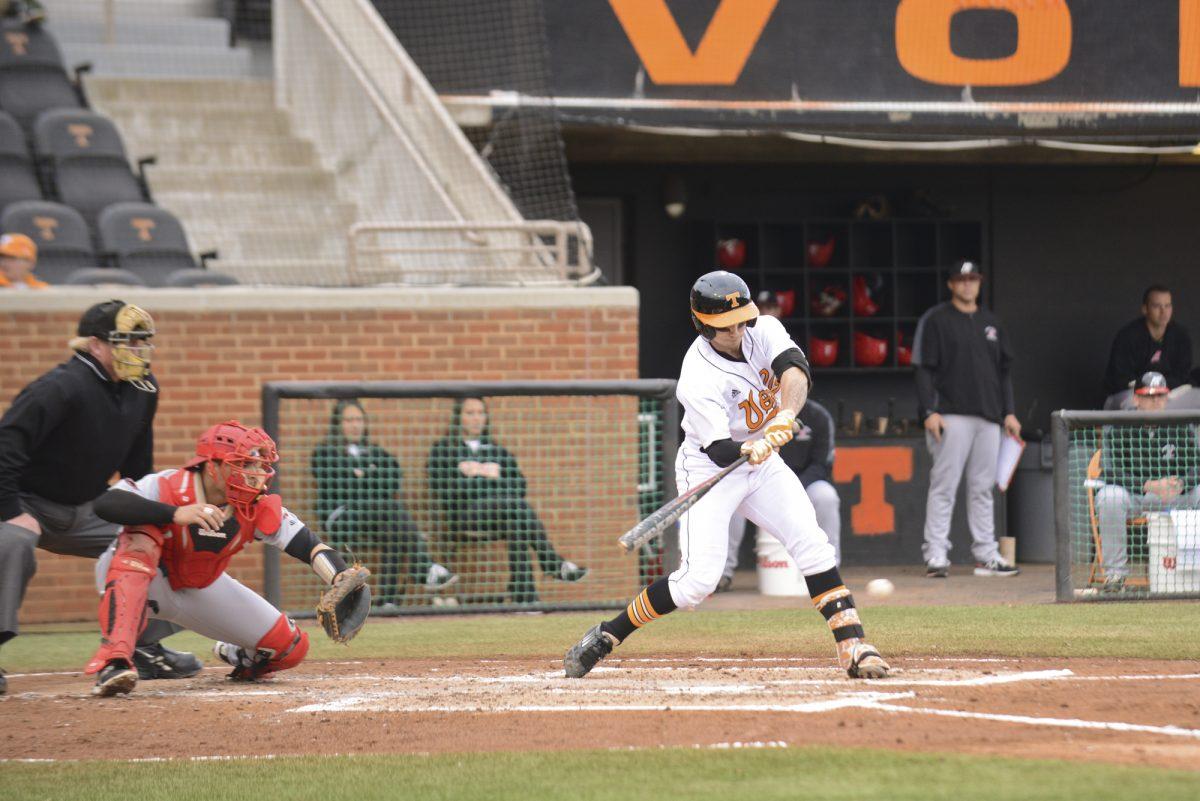 Senior Taylor Smart swings at a pitch in the Vols' 8-7 extra inning victory over the Austin Peay Governors at Lindsey Nelson Stadium on March 18.