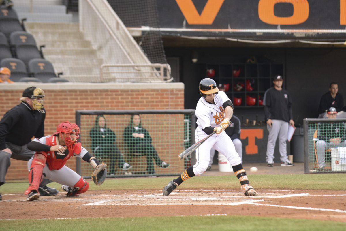 Senior Taylor Smart swings at a pitch in the Vols' 8-7 extra inning victory over the Austin Peay Governors at Lindsey Nelson Stadium on March 18.