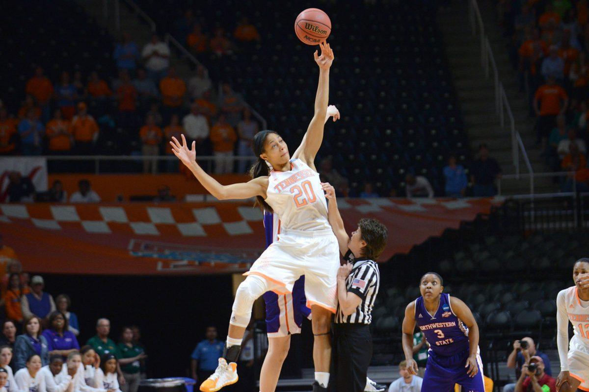 Junior Isabelle Harrison wins the tip off during UT's 70-46 NCAA tournament first round win over the Lady Demons at Thompson-Boling Arena on Saturday.