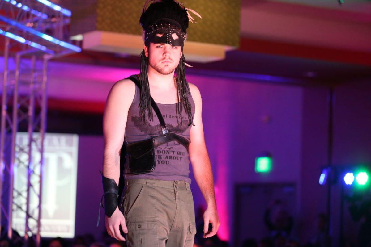The Grand Finale for Knoxville Fashion Week took place in the Holiday Inn World's Fair Park's grand ballroom. Outside the ballroom, local vendors had tables set up for attendees.