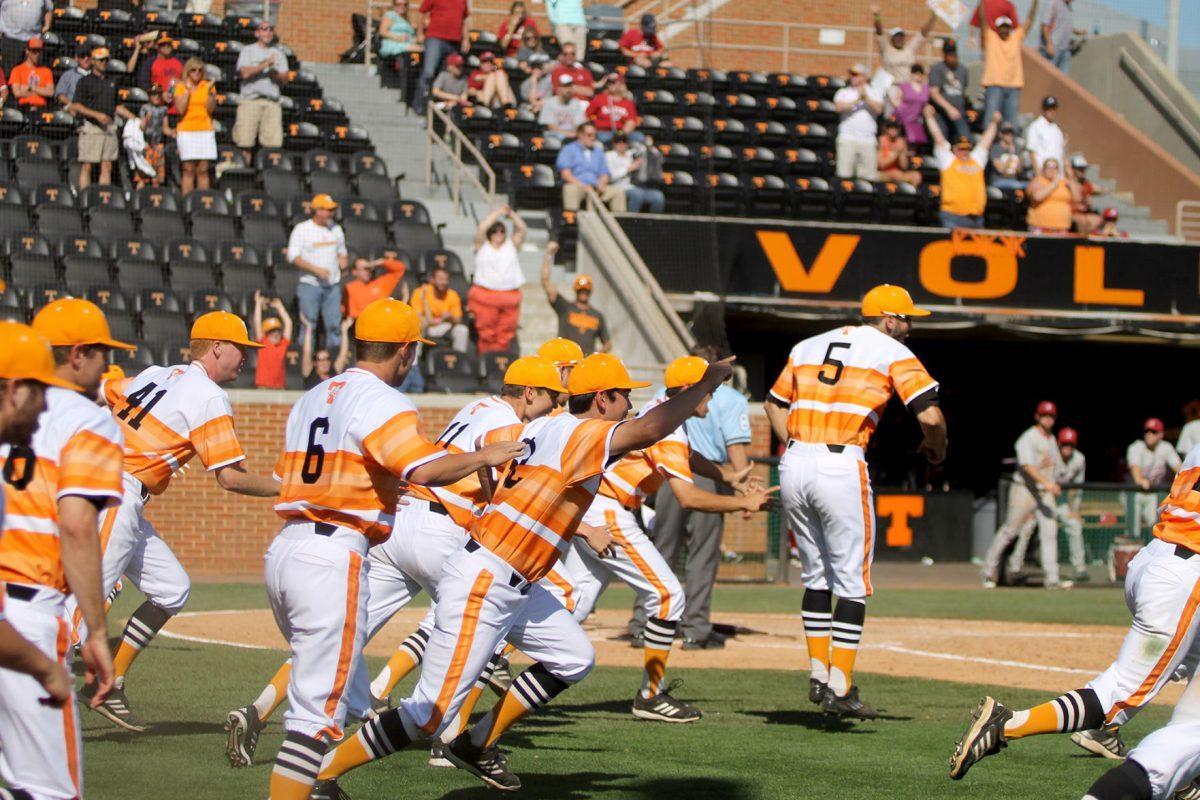 The Vols celebrate their 10-9 comeback victory over Alabama on Sunday April 20th.