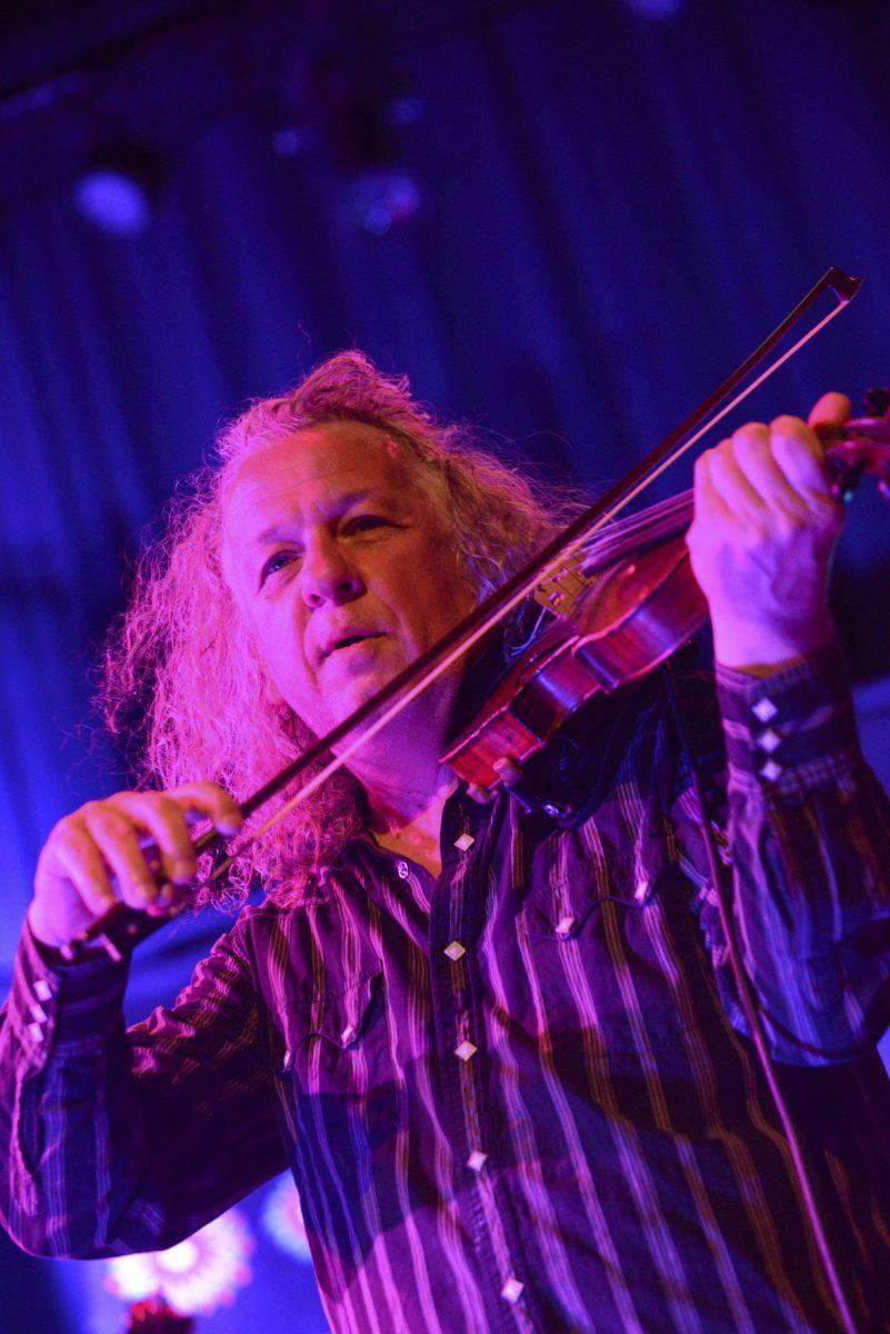 Violinist Tim Carbone of Railroad Earth performs at the Bijou Theatre on Wednesday.