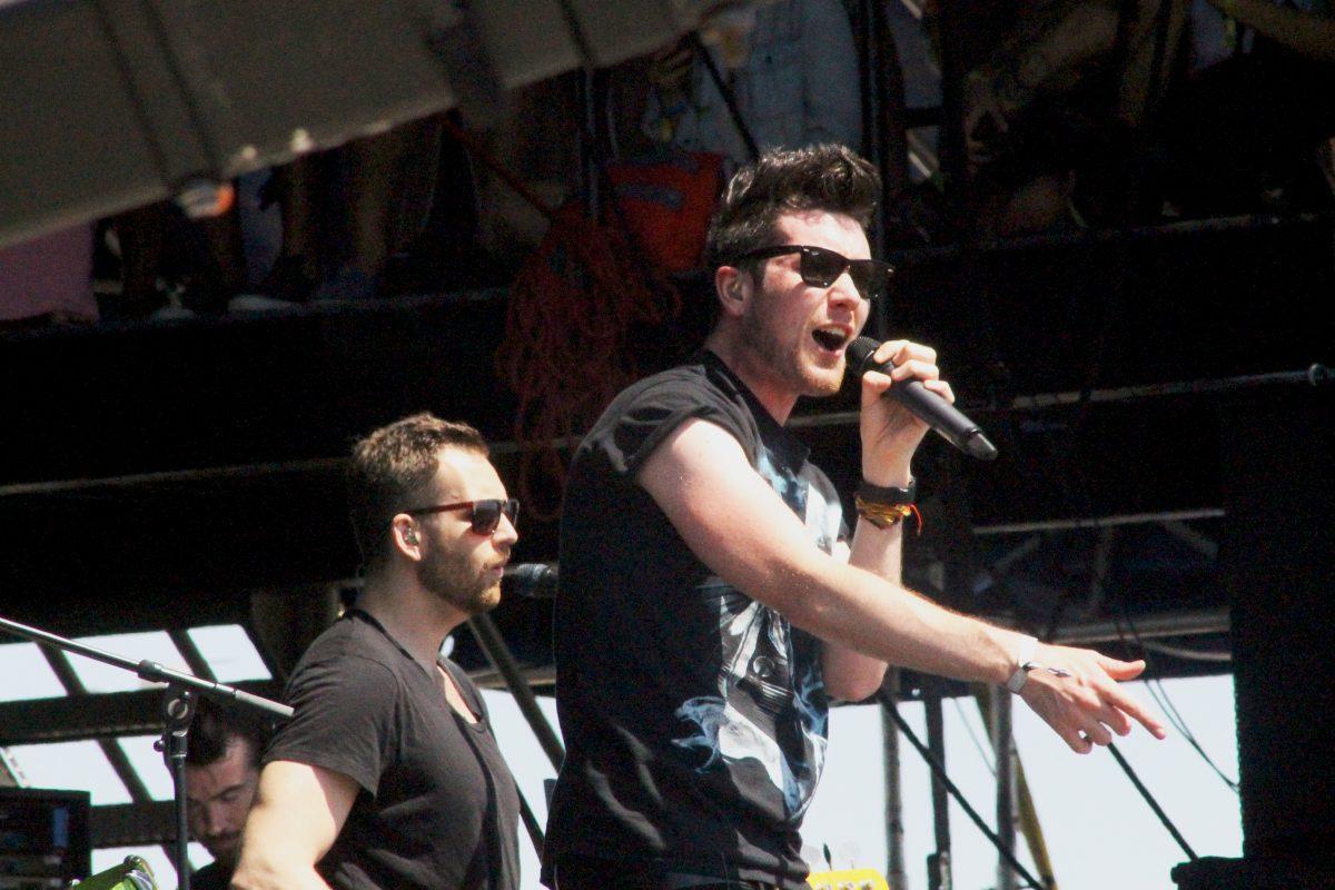 Dan Smith, lead vocals, and William Farquarson, guitarist, from the English rock band Bastille take the Chevrolet Stage at the Hangout Music Festival on Sunday, May 18.