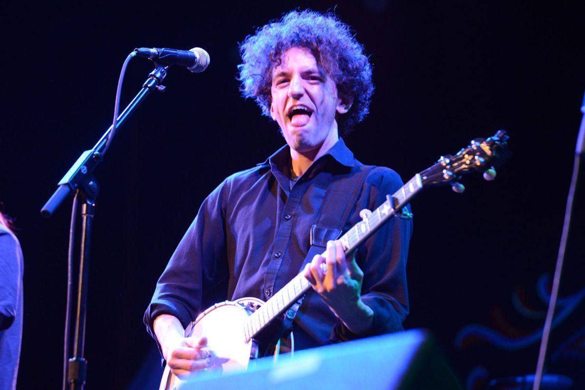 The eccentric banjo player Greg Liszt of the Deadly Gentlemen entertains the crowd at the Bijou Theatre on Wednesday.