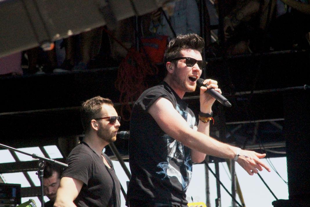 Dan Smith, lead vocals, and William Farquarson, guitarist, from the English rock band Bastille take the Chevrolet Stage at the Hangout Music Festival on Sunday, May 18.