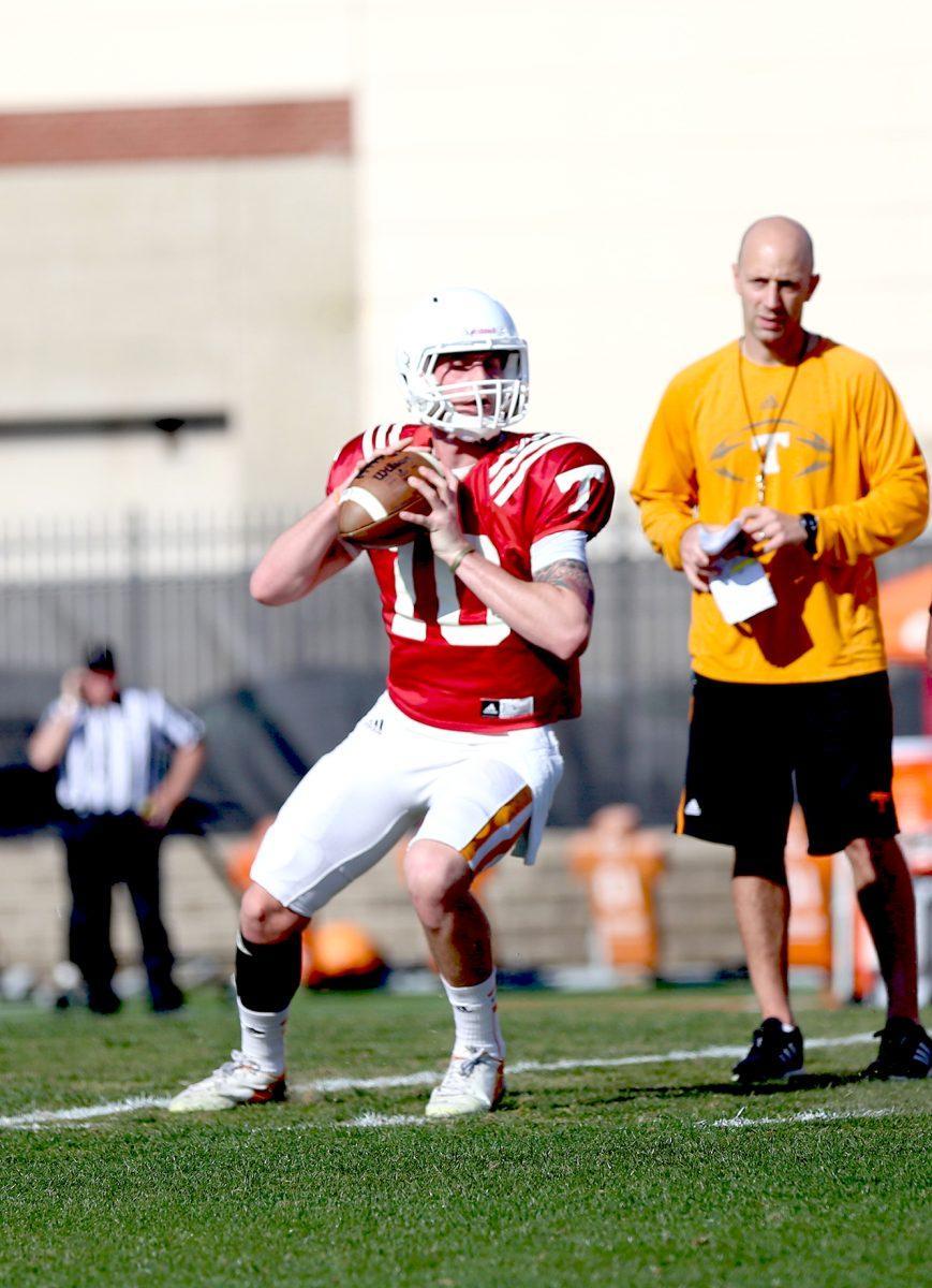 Redshirt freshman Riley Ferguson runs drills during spring football pratice on March 11.
