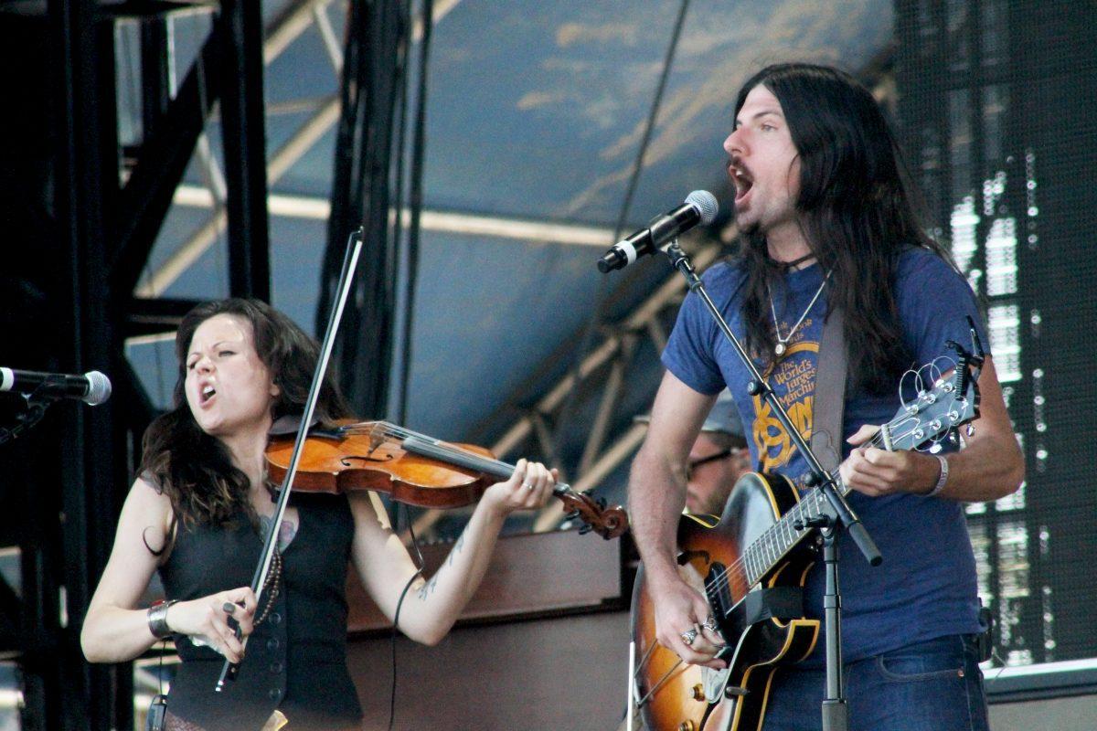 Seth Avett, guitar, and Tania Elizabeth, violin, from The Avett Brothers perform on the Hangout Stage at the 2014 Hangout Music Festival on Sunday, May 18.