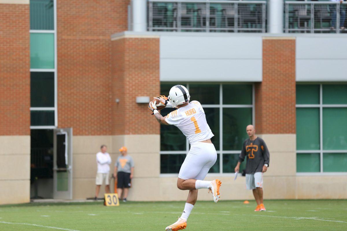 Freshman running back Jalen Hurd catches a pass on the second day of fall training camp on Aug. 2.