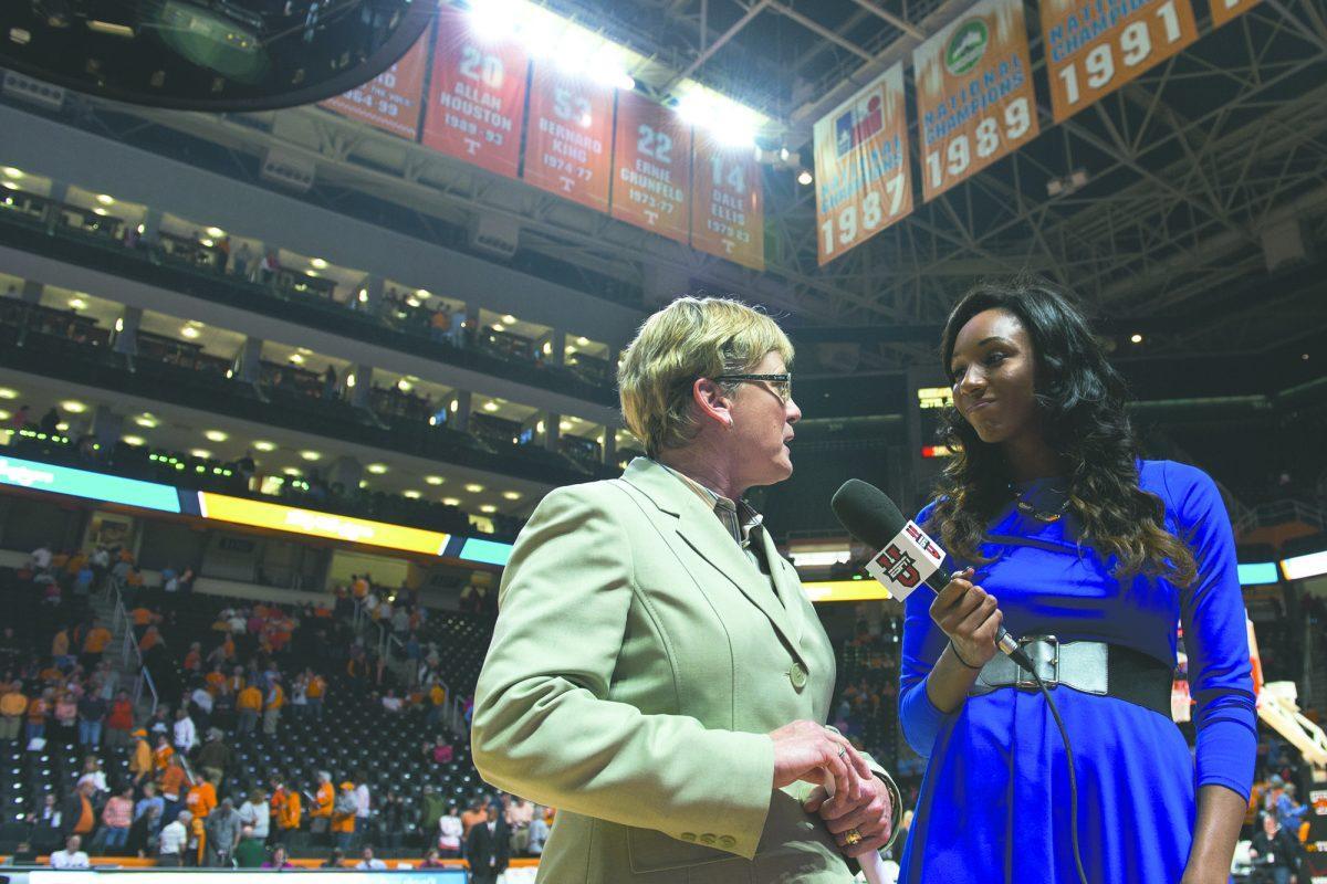 Head Coach Holly Warlick of the Tennessee Lady Volunteers with ESPN U announcer Maria Taylor during the senior day ceremony before the SEC matchup between the South Carolina Gamecocks and the Tennessee Lady Volunteers on Senior Day at Thompson-Boling Arena on March 2.