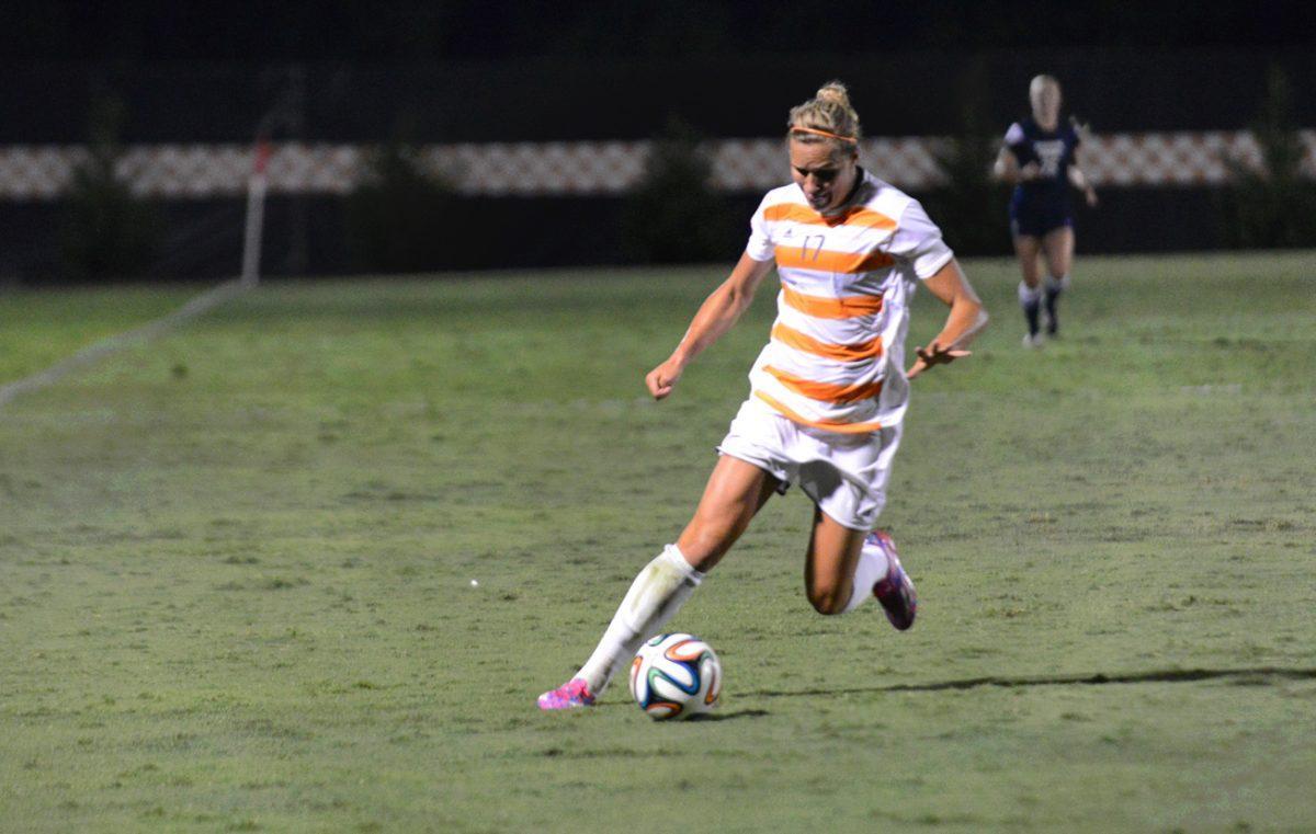 Senior foward Hannah Wilkinson prepares to kick to a teammate during the 0-1 loss to BYU on Aug. 29.