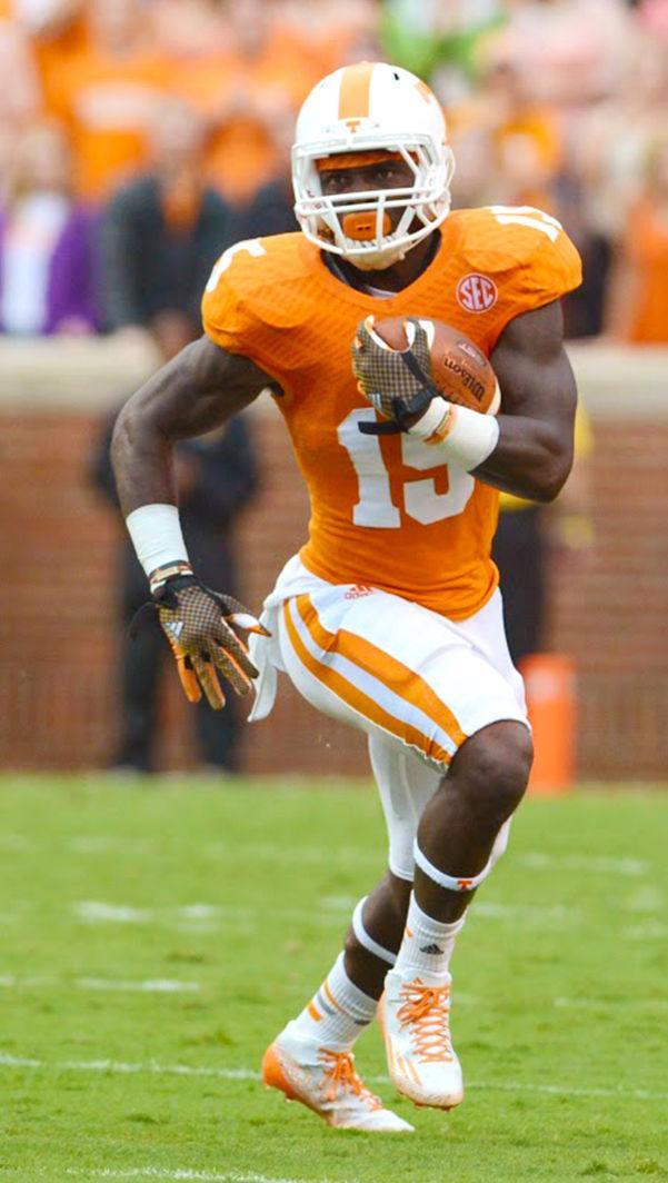 Senior Marlin Lane makes a dash on the field during the game against Utah State.