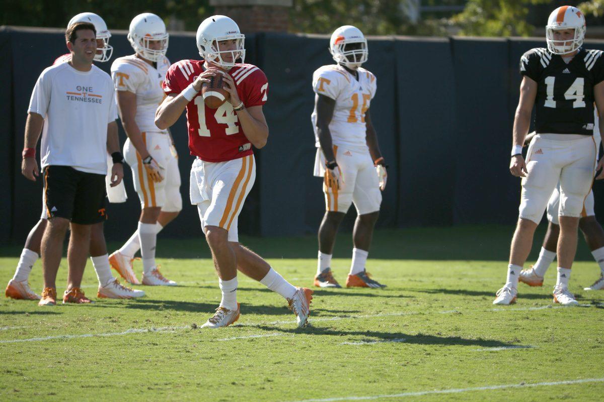 Senior quarterback Justin Worley currently has a 58.3 completion percentage in the 2014 season. Worley steps back for a pass during practice on Sept. 23.