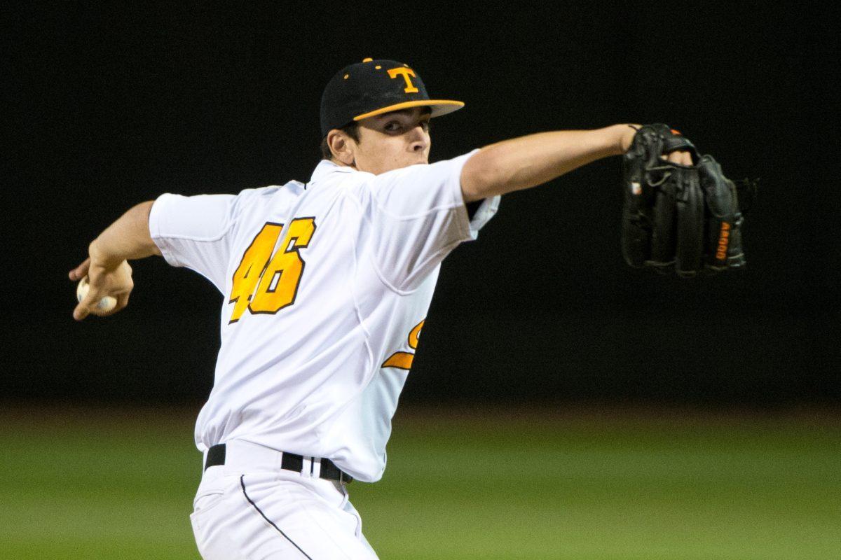 Junior Andy Cox prepares to throw a pitch during UT's game against Auburn University March 21, 2014.