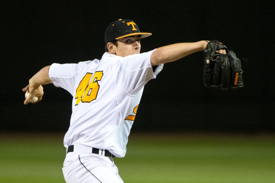 Junior Andy Cox prepares to throw a pitch during UT's game against Auburn University March 21, 2014.