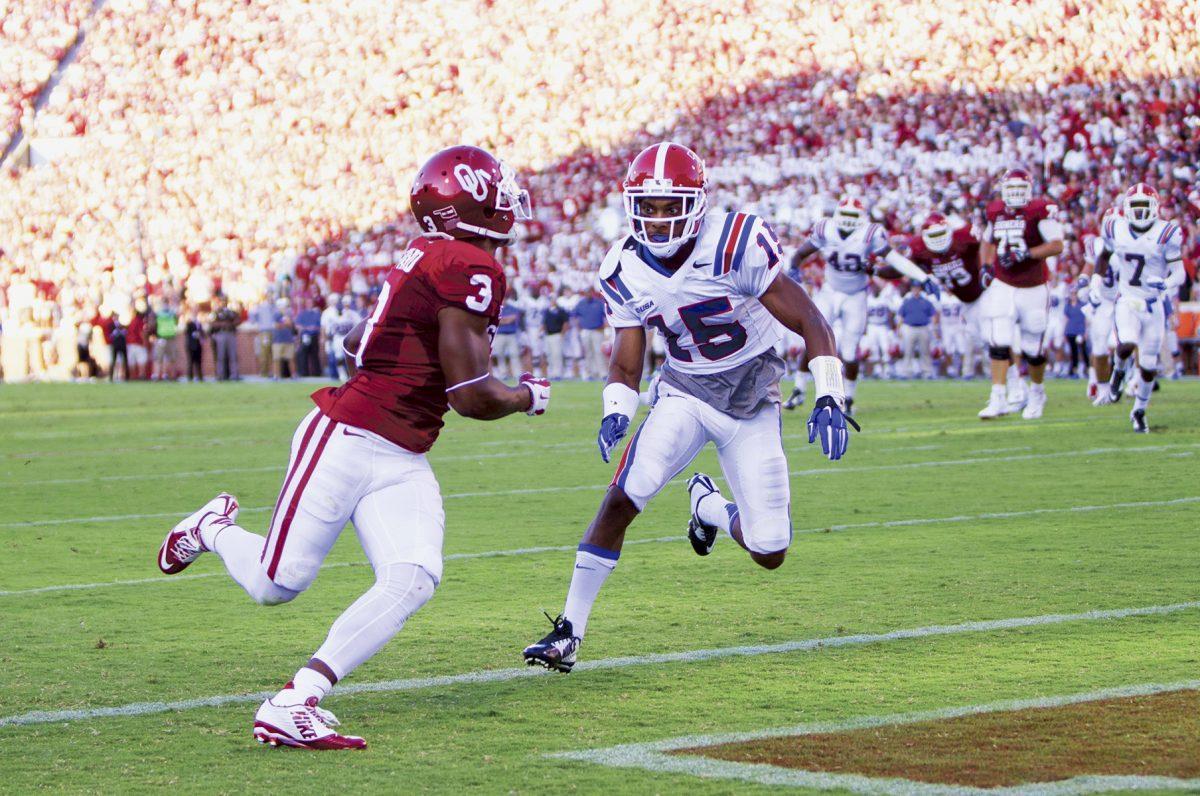 Oklahoma junior wide receiver Sterling Shepard tracks the football in the air during the Sooners' 48-16 victory over Louisiana Tech on Aug. 30.