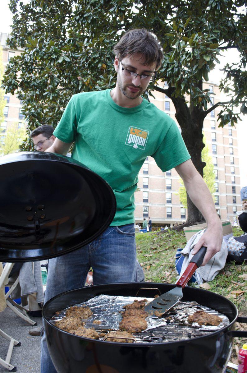 Logan Terheggen, S.P.E.A.K. co-president, grills veggie burgers during the Sustainability Day activities Thursday.