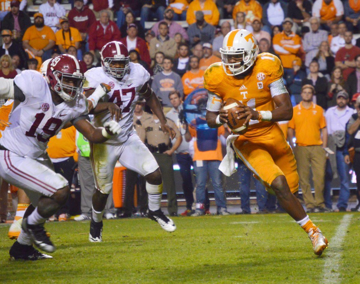 Sophomore Josh Dobbs runs with the ball during the Vols' 34-20 loss to Alabama in Neyland Stadium on Oct. 25th.