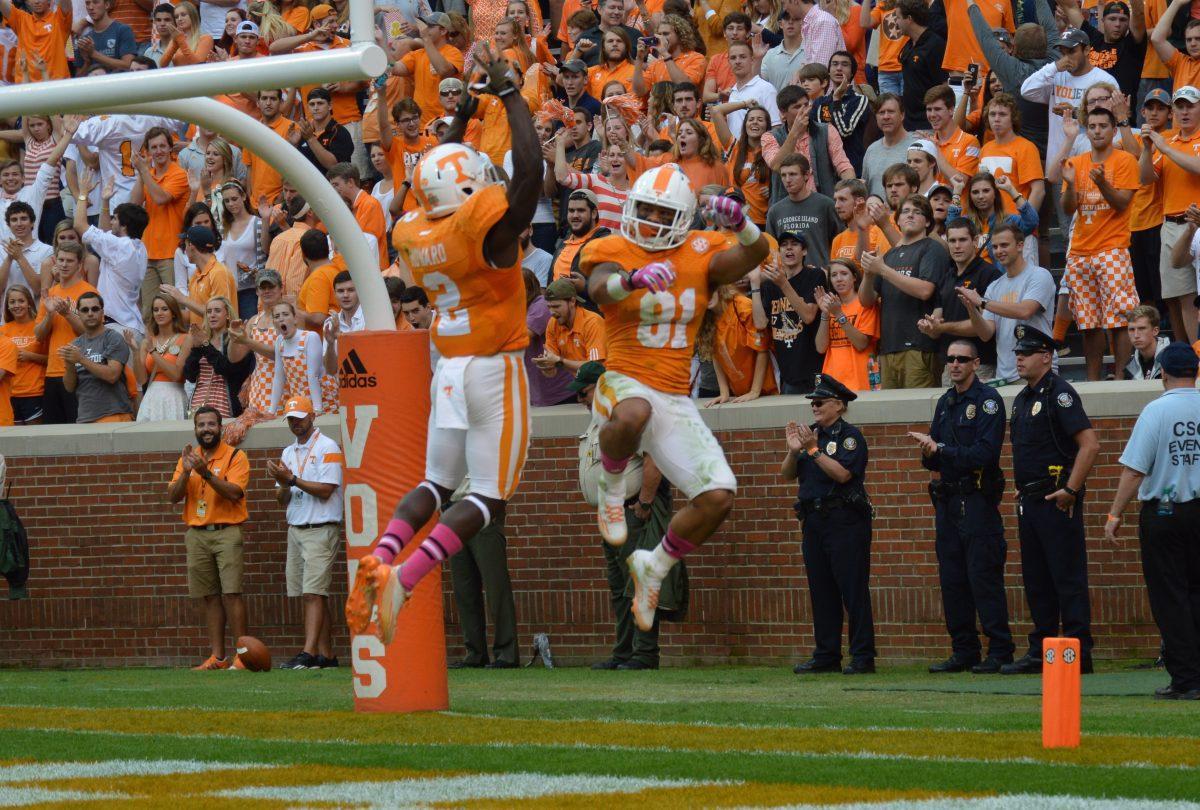 Junior wide receiver Johnathon Johnson celebrates with fellow wideout Alton "Pig" Howard after scoring his second touchdown of the day in the Vols' 45-10 victory over Chattanooga on Saturday.