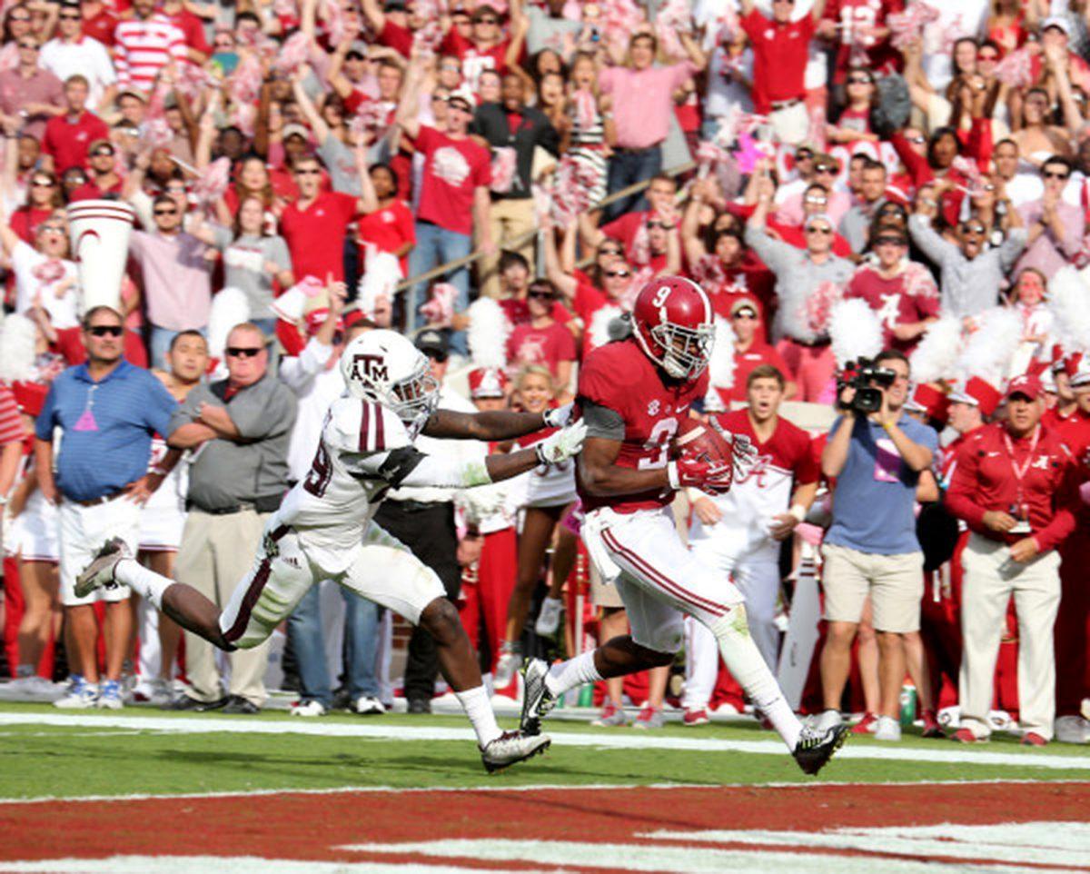 Junior wide receiver Amari Cooper hauls in a 24-yard touchdown pass – his first of two – in the Crimson Tide's, 59-0, win over Texas A&amp;M on Oct. 18