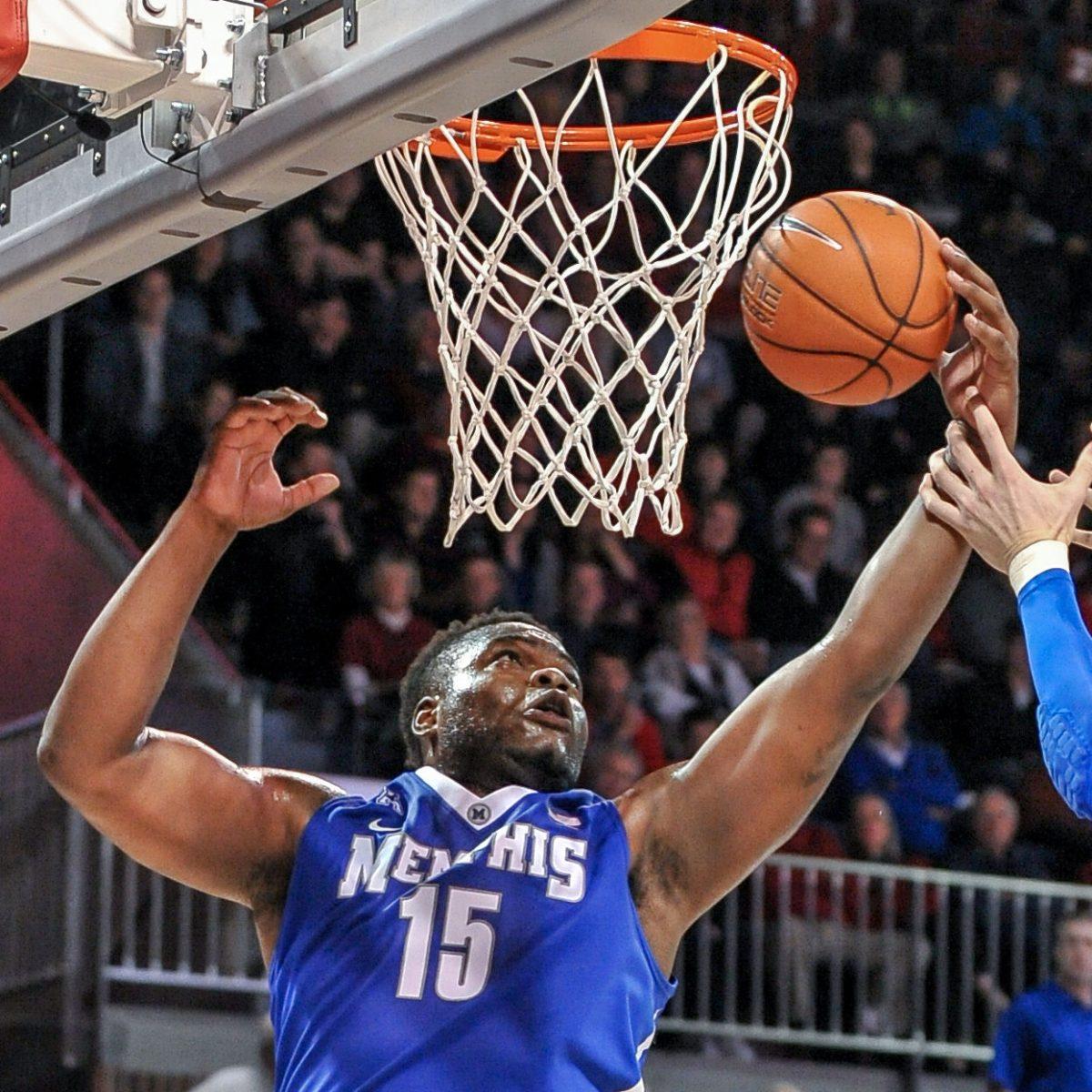 Former Memphis forward Dominic Woodson gets a rebound during the Tigers' loss to SMU on Feb. 1 at Moody Coliseum in Dallas, Texas. Woodson's transfer to Tennessee is expected to be announced on Thursday.