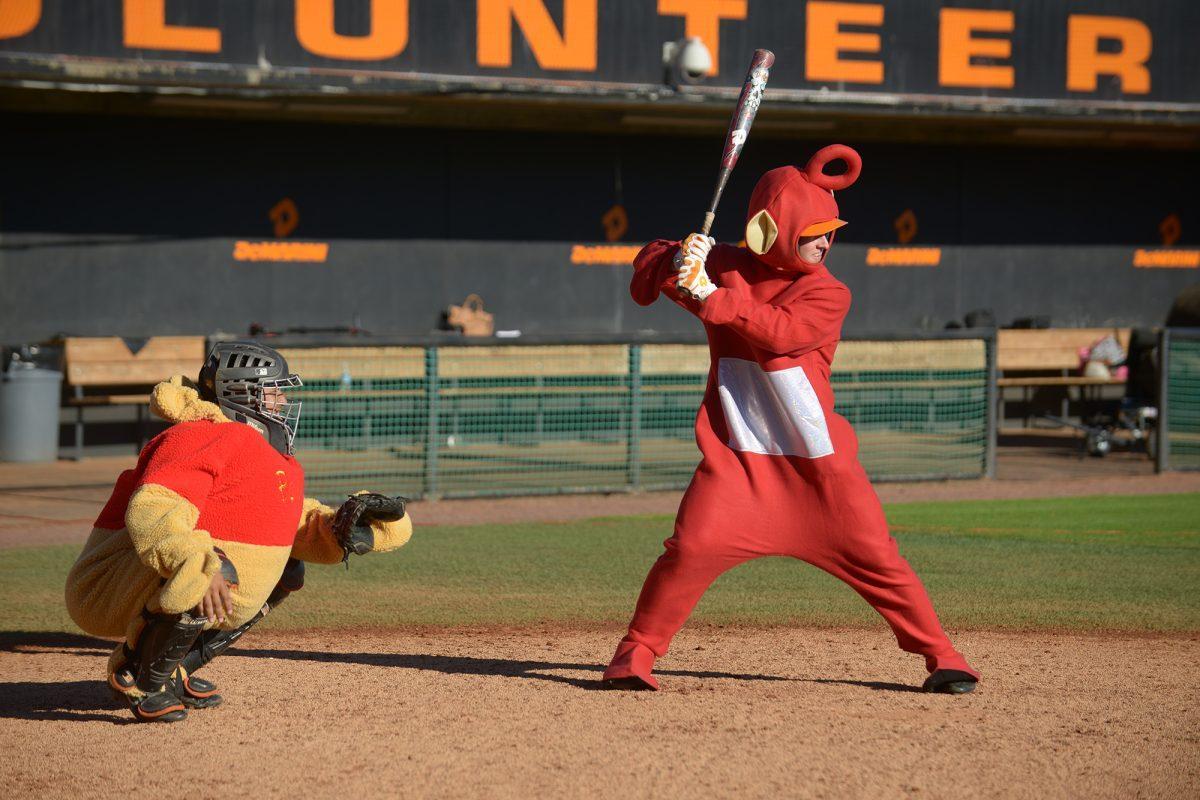 Benito Santiago is Winnie the Pooh, left, and the Telletubby is Woods Caddy, right.